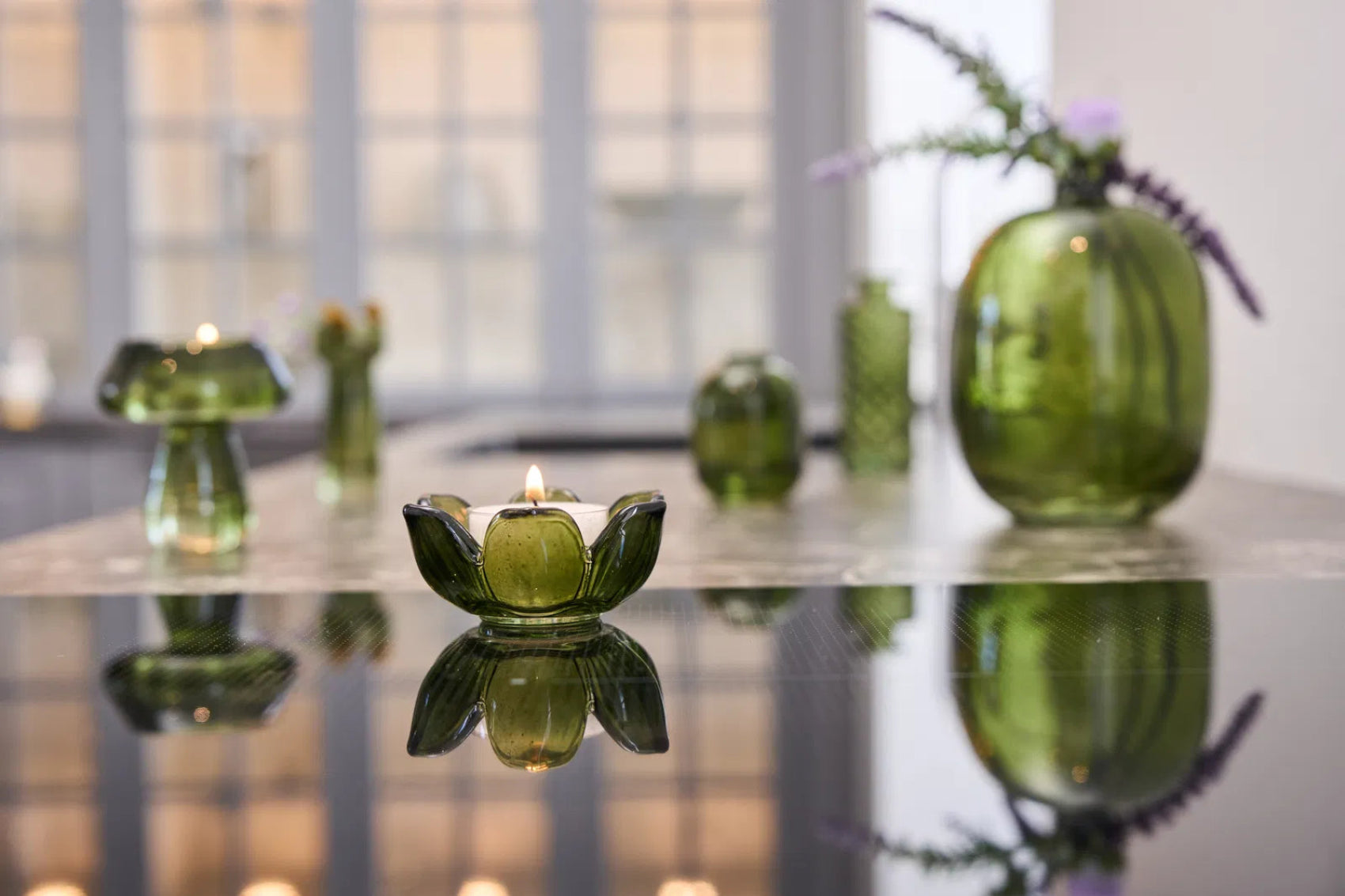 Fyrfadsstage formet som en blomst