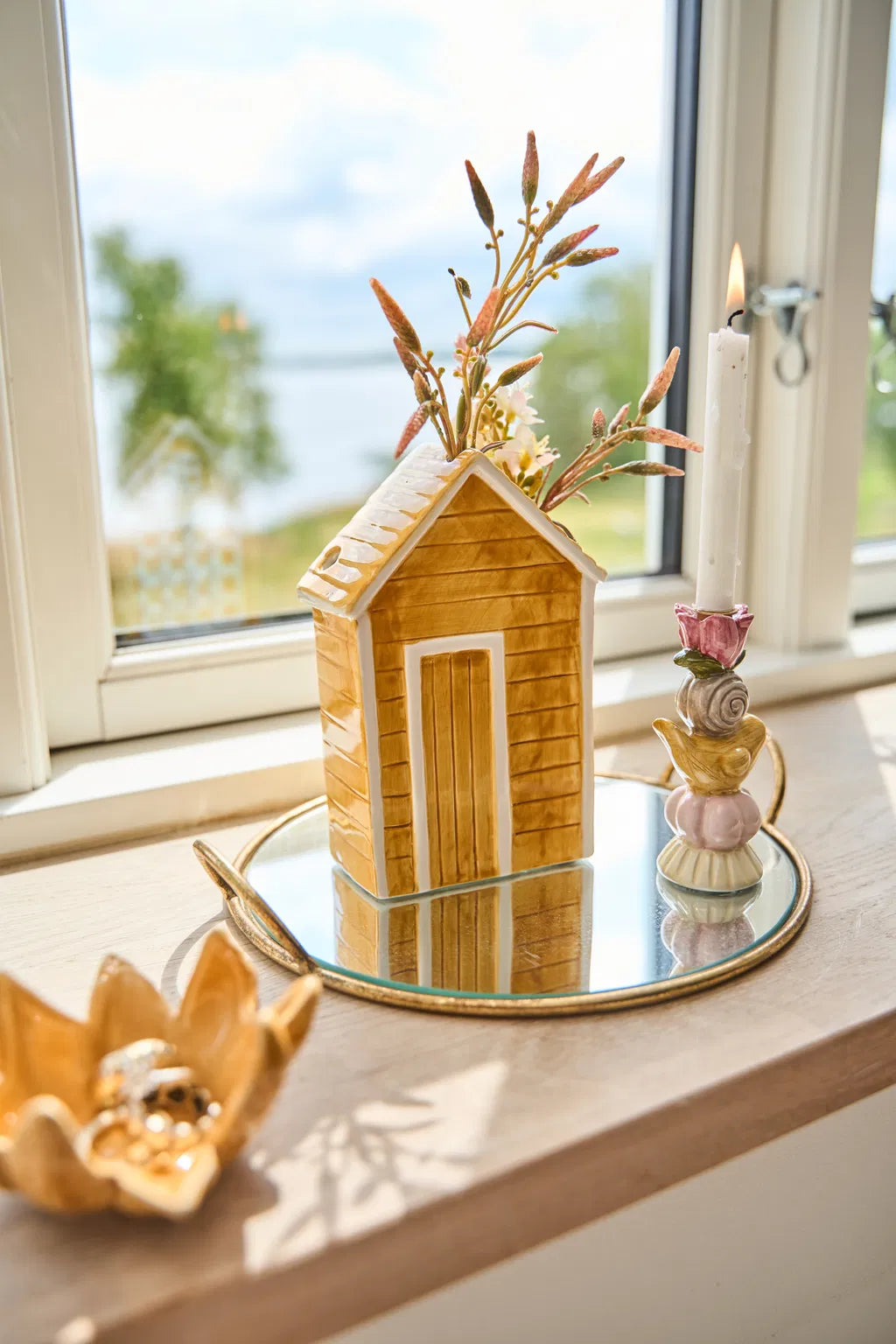 Kertelysestage med kylling og blomst