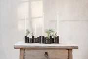 Moderne metalvase med flere cylindriske former i rustik bronze finish – eksklusiv designvase til nordisk boligindretning fra BiMe.dk.